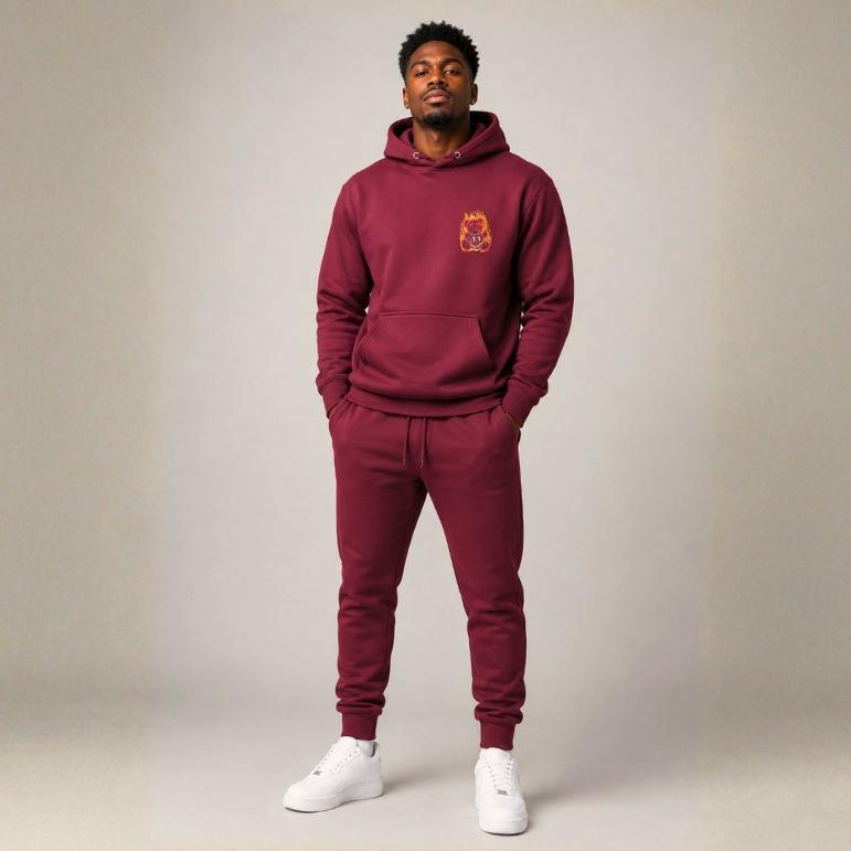 Maroon hoodie with pink retro typography reading ‘Whatever you’re not changing, you’re choosing’ – Roydel Graphic faith‑based streetwear”