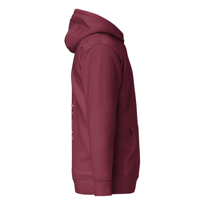 Maroon hoodie with pink retro typography reading ‘Whatever you’re not changing, you’re choosing’ – Roydel Graphic faith‑based streetwear”